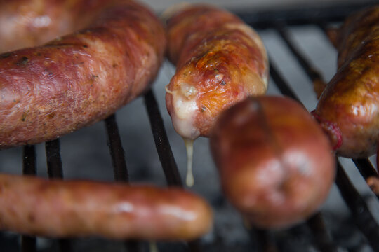 Cooked Argentine Chorizos In Bbq Grill