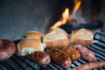cooked argentine chorizos in bbq grill