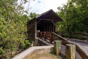 Harrisburg Covered Bridge in Sevier County Tennessee is a popular scenic landmark near the resort towns of Gatlinburg and Pigeon Forge. It is owned by the state of Tennessee and not privately owned. 