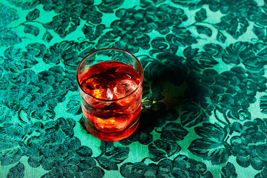 Red Cocktail on Green