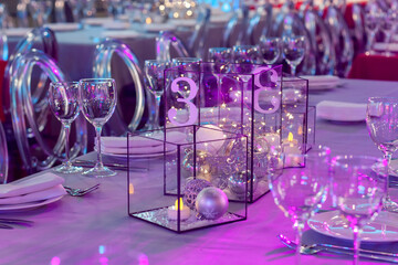 The table in the restaurant is decorated with Christmas decorations
