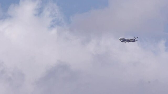 Indigo Airplane flight flying in blue cloudy sky in Indore, India 20,August 2020. selective focus with blur.
