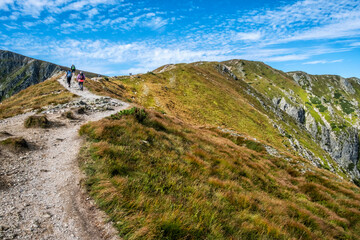 Fototapeta na wymiar Tourists in Western Tatras, Slovakia, hiking theme
