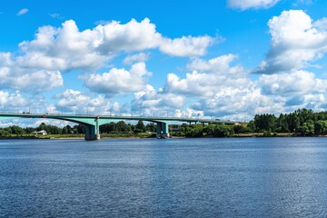 Russia, Yaroslavl, July 2020. View of the large bridge over the Volga river on a sunny day.