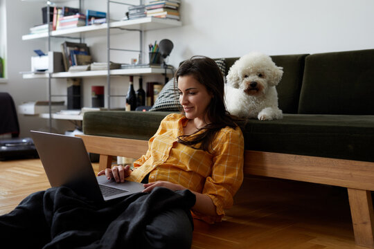 Young woman working from home.
