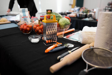 grater and vegetables on the table