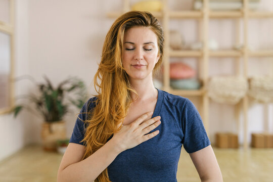 Woman practice yoga in a yoga studio