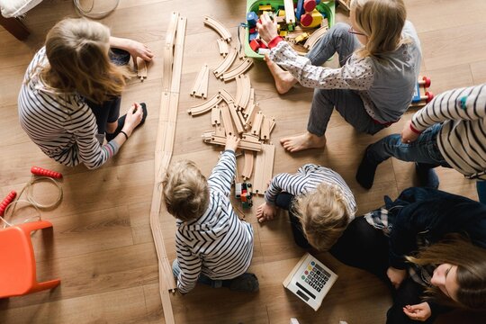 kids playing on Christmas Day with their toys