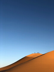 Fototapeta na wymiar a beautiful blue sky in contrast to the sand