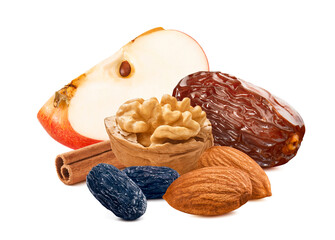 Slice of apple, date, raisin, cinnamon walnut and almond nuts isolated on white background