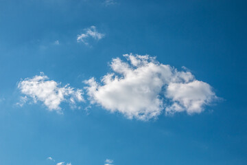 A cloud in shape of a fish in the blue sky
