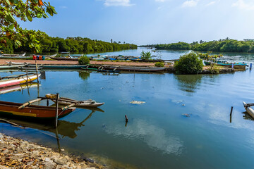 Fototapeta na wymiar A view across a jetty in the lagoon in Negombo, Sri Lanka
