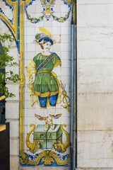panels of polychrome azulejos on the walls of a beautiful house in Setubal