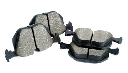 car disc brake pads on white background, isolate, selective focus