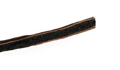 Vanilla pod cut with knife, aromatic seeds visible, closeup detail photo isolated on white background