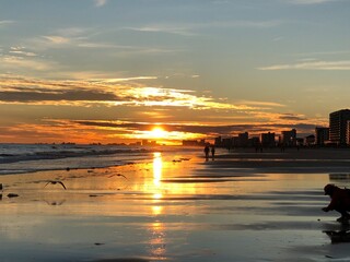 Scenery of beautiful sunset in North Myrtle Beach, South Carolina, along with water sky reflection