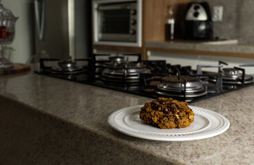 Chocolate cookies on table in the kitchen. Chocolate chip cookies shot