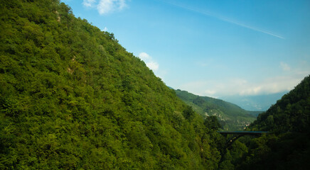 Fototapeta na wymiar Montenegrin mountains with dense forests, travel around Europe by bus