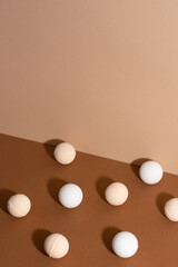 Bath salt bomb isolated on a beige background.