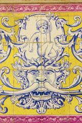 Fototapeta na wymiar panels of polychrome azulejos on the walls of a beautiful ruined house in Setubal