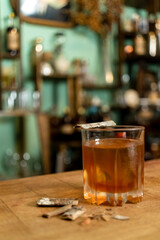glass of drink on bar counter