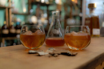glass of drink on bar counter