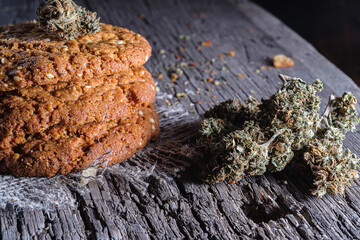 biscuits with hemp on an old wooden background close-up. rustic. Horizontal orientation.