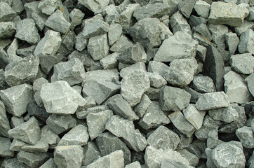 Grey hard rocks used for construction landscaping