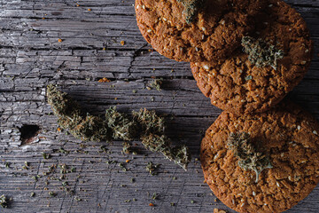 biscuits with hemp on an old wooden background close-up. rustic. Horizontal orientation.
