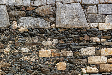 Architecture textures, detailed rusty and rustic old wall masonry schist