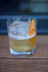 Whiskey sour on a wooden table

