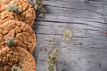 biscuits with hemp on an old wooden background close-up. rustic. Horizontal orientation.