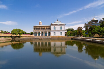 Reflection in the pond of the ancient summer home of Emir, near Bukhara, Uzbekistan