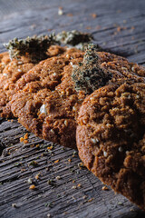 biscuits with hemp on an old wooden background close-up. rustic. Vertical orientation.