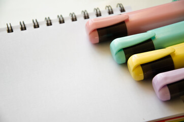 banner for school. colored pencils lie on a notebook. teaching at school. school supplies