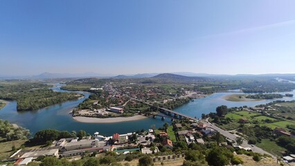 Fototapeta na wymiar Panorama of the city with a bridge and a river