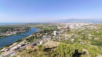 Panorama of the city with a bridge and a river