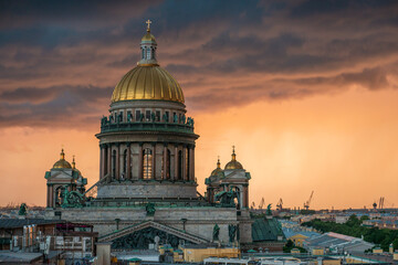 View of St. Isaac's Cathedral, Saint Petersburg city, Russia. Storm clouds on the horizon, beautiful cityscape in a thunder - 377209310