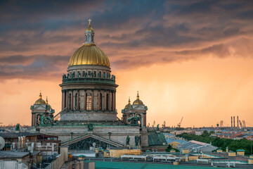 View of St. Isaac's Cathedral, Saint Petersburg city, Russia. Storm clouds on the horizon,...