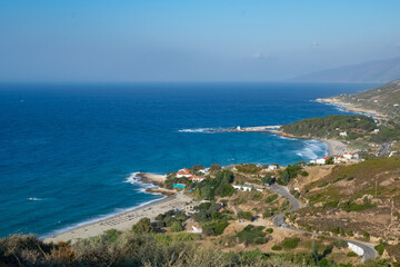 Fototapeta na wymiar Ikaria coastlinewith sand beaches in the Mediterranean Sea of Greece