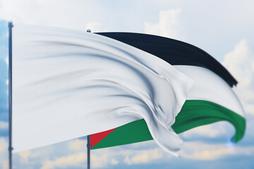 White flag on flagpole waving in the wind and flag of Jordan. Closeup view, 3D illustration.