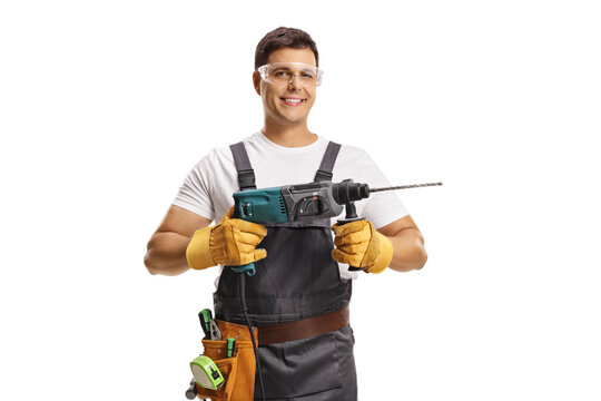 Reoairman with protective goggles and a drilling machine