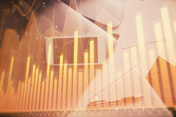 Multi exposure of forex graph hologram over desktop with phone. Top view. Mobile trade platform concept.