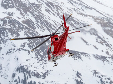 Alpine rescue helicopter in winter