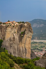 Fototapeta na wymiar Vertical image of Monastery on Meteora rock, Greece in Summer
