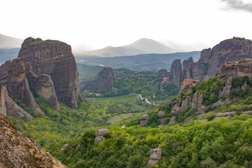 Fototapeta na wymiar Incredible landscape of the Meteora rocks with Monastery on top of the hill