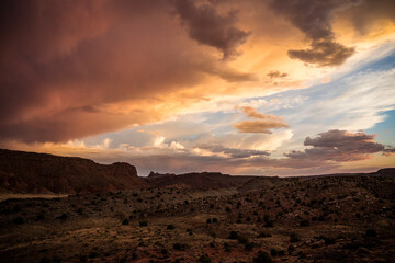 Landscape view of Arches National Park in Utah at sunset right after a thunderstorm (Utah).