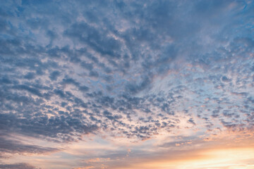 Colorful clouds after rain at sunset time.