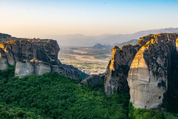 Fototapeta na wymiar Forest rocks and valley of Meteora, Greece in a summer morning