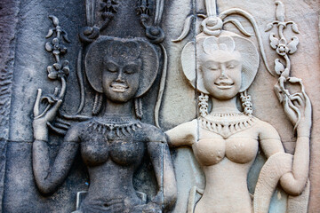 Fototapeta na wymiar Angkor Wat temple carvings